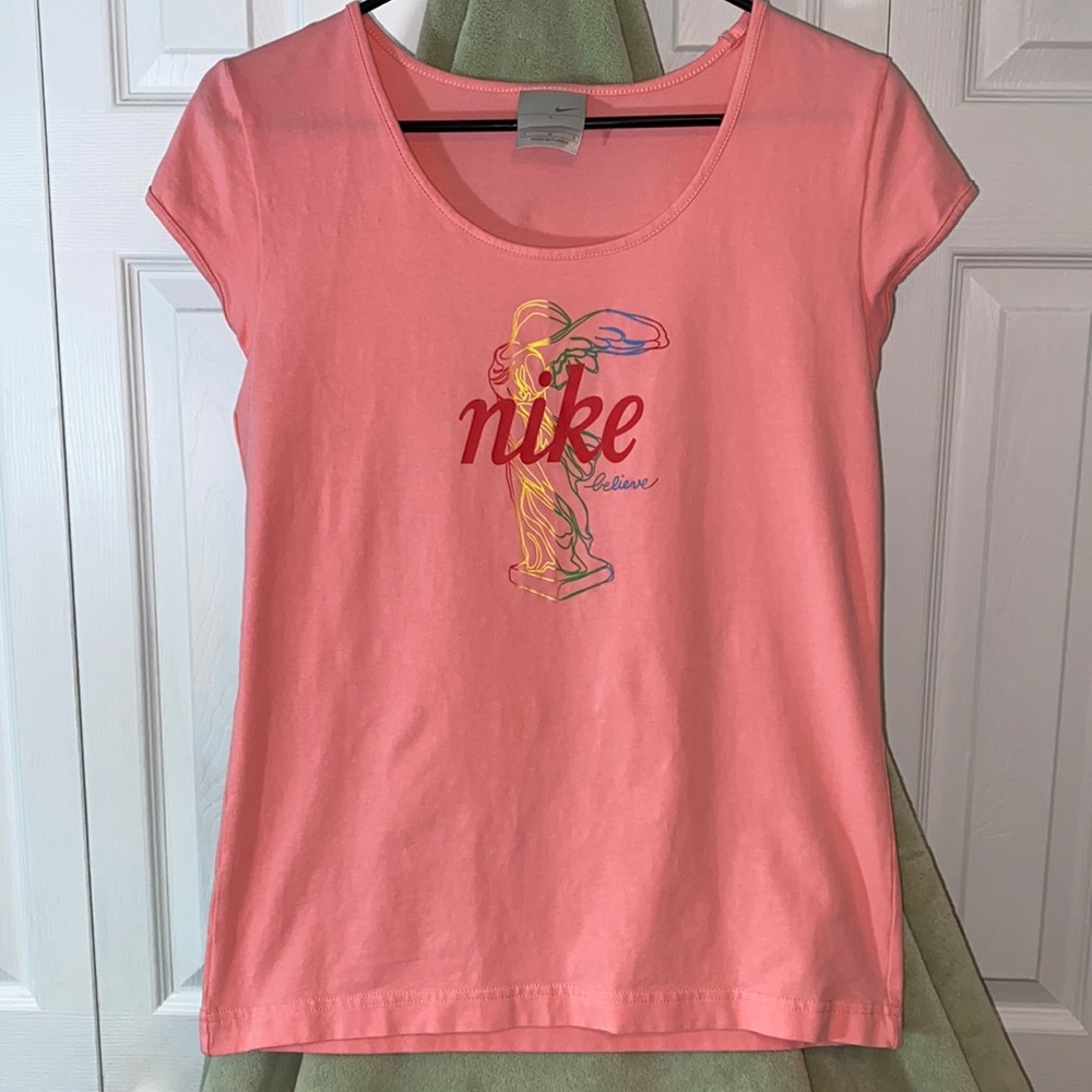 NIKE. WOMENS TOP. “BELIEVE”. SIZE L